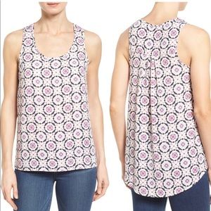 Halogen scoop neck tank